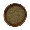 Gesneden oregano in een houten kom