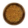 Grove Chakalaka kruidenmix met paprika en groenten in een houten kom