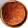paprika-vlokken-snippers-rood - Olie & Azijn Karavaan Bakje met gedroogde rode paprikastukjes van 1–3 mm.