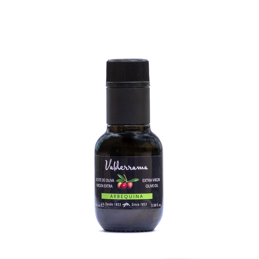 Arbequina_100_ml - Olie & Azijn Karavaan Flesje olijfolie van eerste persing Arbequina 100 ml op witte achtergrond, geschikt voor productpagina.