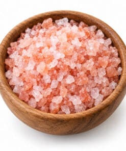 Grof roze Himalayazout van 2 tot 5 millimeter in een houten kom