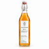 appelciderazijn 500 ml in beugelfles met smal Olie & Azijnkaravaan-etiket – representatieve illustratie